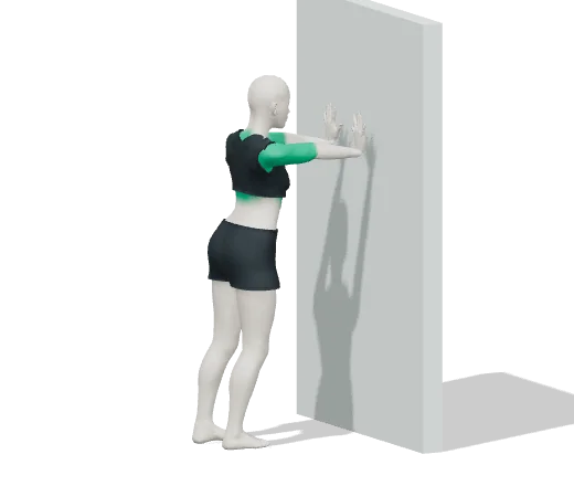 Wall push-up, step 1: Palms on the wall at shoulder height